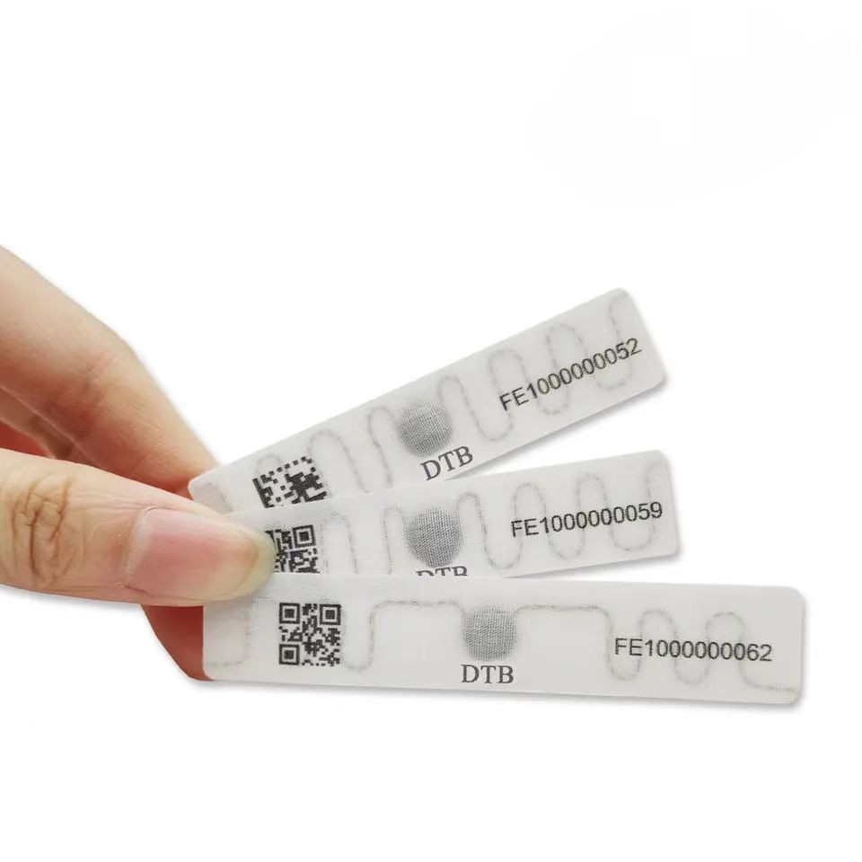 Etiqueta de lavanderia lavável RFID UHF Etiqueta de lavagem de tecido Etiqueta de roupa